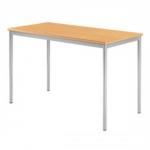 The rectangular classroom table measures 120 x 60cm and has a silver frame. The tabletop is made of beech wood. The table is unbranded and has a simple, versatile design. It is suitable for various purposes, such as meetings or group work.