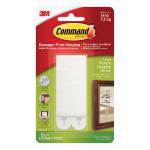 The photograph of the Command Picture Hanging strips shows four large white strips with adhesive backing. They are designed for easy and damage-free hanging of pictures and frames. Each strip has the 3M logo clearly visible.