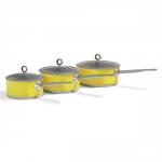 The photograph captures a bright and vibrant Morphy Richards Accents Yellow 3 Piece Saucepan Set. The sleek and stylish design features three different sizes, making it perfect for any cooking task. The set includes a handy lid for each pan, adding practicality to its aesthetic appeal.