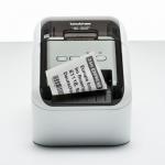 The photo shows a professional label printer from Brother, specifically the QL800 model. It can print 62mm width labels at a speed of 148mm per second. This printer is easy to use, simply Plug and Print.
