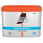 A photo of Nescafe Decaf Coffee Nescafe Azera Decaffeinated 240G Tin 162329 shows a metallic red tin with the Nescafe logo and product name prominently displayed. The tin features a resealable lid and contains 240 grams of decaffeinated coffee. The rich, dark coffee grounds can be seen through a clear window on the front of the tin.