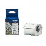 The photograph features a stack of Brother label tapes in various colors, and a Brother colour label printer with a 50mm wide roll cassette. The labels and printer are neatly arranged on a clean surface, creating a professional appearance.