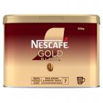 The image shows a shiny, metallic tin of Nescafe Gold Blend Instant Coffee, filled with 500g of rich and aromatic coffee grounds. The Nescafe logo is prominently displayed on the front, while the elegant gold and black packaging adds a touch of sophistication. The tin is sealed with a red lid, signaling the freshness of the product inside.