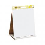 A group of Post-it flipchart pads displayed on a Super Sticky Table Top Easel Pad, with a 3M Dry Erase Board nearby. The bright colors and large writing space make it perfect for brainstorming sessions or presentations.