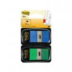 A bright and colorful image showcasing the Post-it Index Tabs in green and blue, perfect for organizing and marking pages with ease. The 100 pack provides an ample supply for big projects. The tabs are neatly lined up and ready to be used.