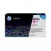 The picture shows a vibrant magenta HP ink cartridge with a sleek design. The label reads 646A Laser Toner Cartridge and 12500pp for page life. The cartridge is branded with the HP logo and has the product code CF033A 4072021.