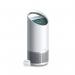 The picture shows a sleek and modern Leitz TruSens Z-2000 Air Purifier with a matching SensorPod. The purifier is illuminated with a soft blue light and the SensorPod is placed nearby, monitoring the air quality. The overall design is both functional and stylish, making it a great addition to any home or office space.
