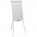 This picture shows a sturdy black tripod easel with a classic steel design. It stands tall with an adjustable height feature and has a tray at the bottom for holding markers or other supplies. The easel also comes with a large flip chart pad, ready to be used for presentations or brainstorming sessions. The top of the easel has a clip to hold the pad securely in place. The overall appearance is professional and practical, perfect for any office or conference room setting.