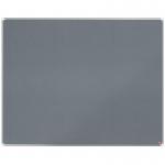 The image shows a sleek and modern Noble Premium Plus felt notice board by ACCO Brands. The background is a cool shade of grey, providing a neutral canvas for any pinned notices or messages. The dimensions are 1500x1200mm, offering ample space for displaying various items. The surface is made of premium quality felt, giving it a soft and velvety texture. The edges are clean and sharp, ensuring a professional and polished look. This notice board is perfect for any office or home setting, adding function and style to any space.