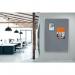 In this photo, we see a large grey felt notice board, measuring 2400x1200mm, made by ACCO Brands under their Nobo Premium Plus range. The board is mounted on a wall and is surrounded by a sleek aluminum frame. Various notes and important messages are pinned to the board, creating a collage of information. The grey felt provides a soft and professional background for the pinned items, making them stand out. This notice board is perfect for displaying important information in offices, schools, or conference spaces.