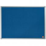 The image shows a blue felt notice board measuring 600x450mm. The felt material creates a textured surface, perfect for pinning up important messages and reminders. The sleek design of the Nobo Essence board from ACCO Brands adds a touch of sophistication to any space. The board is cleanly cut, with smooth edges and a vibrant blue color. The compact size makes it suitable for smaller spaces, while still providing ample room for displaying notes. Overall, the board exudes professionalism and functionality.