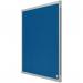 The photograph showcases a sleek and modern 600x450mm blue Nobo Essence Felt Notice Board by ACCO Brands. The surface is covered in high-quality felt, creating a soft and pin-friendly backdrop for displaying important notes and documents. The frame is made of sturdy materials and has a clean and elegant design. The notice board can easily be mounted on any wall, adding a touch of professionalism to any space. Overall, the photograph captures a functional and stylish addition to any office or home workspace.