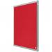 The photo shows a vibrant red Nobo Essence Felt Notice Board, standing at 600x450mm in size. The smooth felt surface provides a perfect display space for important notices and reminders. The board is bordered by elegant silver frames, adding a touch of sophistication to its appearance. With its compact yet eye-catching design, this ACCO Brands Noticeboard is a practical addition to any home or office setting.