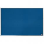 The photograph shows a sleek and stylish ACCO Brands Noticeboards Nobo Essence Felt Notice Board. The blue color adds a pop of vibrancy to the 900x600mm board, making it a decorative and functional addition to any space. The felt material provides a smooth surface for notes and announcements to easily adhere to. The overall design exudes simplicity and sophistication, making it a great choice for any office or home setting.