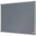 The photo shows a sleek and stylish grey felt notice board from Nobo Essence. Measuring 600x450mm, it is the perfect size for small memos and important notices. The smooth felt surface provides a clean and professional look, while the ACCO Brands logo adds a touch of authority. The board is mounted on a sturdy frame, creating a durable and long-lasting product.