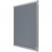 The picture shows a sleek grey felt notice board with the brand ACCO Brands Noticeboards Nobo Essence written in the corner. The narrow frame adds a stylish touch to the board, which measures 600x450mm. A piece of paper, held in place by colorful push pins, can be seen in the center of the board. The soft felt surface is perfect for pinning important notes, reminders, and other important documents. The overall design is modern and minimalist, making it suitable for any office or home setting.