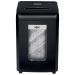 The image shows a sleek, silver Rexel ProMax QS RSX1538 Cross Cut Paper Shredder in a medium-sized office setting. It is shredding 15 sheets of paper at once, providing P4 level security. The compact 38L bin is easily accessible and the machine operates silently, making it ideal for use in a small office.