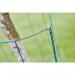 The photograph shows the green ACCO Brands Tools Rapid VR22 Fence Hogrings in all their precise detail. The hogrings are neatly arranged in a stack, with their sharp ends pointing upwards. Each hogring features a textured surface, providing a secure grip to ensure a strong hold. The vibrant green color adds a pop of color to any fencing project. Overall, the photograph showcases the durability and functionality of these hogrings.