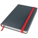 This photo shows a luxurious Leitz Cosy Notebook, with a soft touch cover in a sleek velvet grey color. The ruled pages inside provide a neat and organized layout, perfect for note-taking or journaling. The hardcover adds durability to protect your pages and the stylish design makes it an eye-catching accessory.