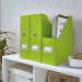 The photo shows a bright green book and magazine rack from ACCO Brands. The magazine file features a label holder and thumbhole, making it easy to organize and access your reading materials. The Click & Store design allows for easy assembly and storage when not in use.