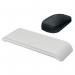 In the image, we see a light grey mouse wrist rest from ACCO Brands Leitz Ergo Cosy Range. The wrist rest is adjustable and designed for use with both left and right handed users. The desktop pad is made of foam, providing cushioned support for the wrist while using a mouse. Its sleek design is the perfect addition to any workspace.