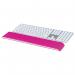 The photograph shows a vibrant pink ACCO Brands Leitz Ergo WOW Wrist Rests with an adjustable keyboard wrist rest. The soft and supportive material provides comfortable cushioning for the wrists, while the sleek design adds a touch of color to any desk setup.