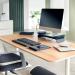 The photograph captures a sleek and modern wrist rest, designed by ACCO Brands. The Leitz Ergo Adjustable Keyboard Wrist Rest is highlighted in a velvet grey color and features a foam cushioned support pad. Perfect for both left and right handed users, this desktop wrist rest provides long-lasting comfort for extended periods of typing.