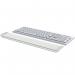 The photograph features two padded wrist rests, one for each hand, designed to be used with a desktop keyboard. The rests are made of comfortable foam and are adjustable for a personalized fit. The light grey color adds a soft touch to any workspace.