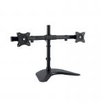 This photograph features a sleek, modern monitor arm from ACCO Brands with a free-standing base for dual-monitor support. The arm is made by Kensington and boasts a sturdy design with a shiny silver finish. The dual arms can be adjusted for maximum ergonomic comfort while working.