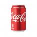 A refreshingly cold 330ml can of Coca-Cola Soft Drink, perfect for any occasion. The iconic red and white label stands out against the crisp, silver can. The icy condensation and bubbles inside beckon for a refreshing sip.