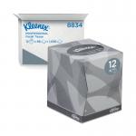 A photograph of Kleenex® Facial Tissues would show a square, white cube-shaped box with the Kleenex logo prominently displayed on the front. The box would contain 90 sheets of soft, white facial tissues, neatly stacked and ready for use. The packaging would be clean and simple, with no additional decorations or colors. The tissues themselves would be soft and gentle, perfect for wiping away tears or sneezes.