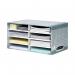 A photograph of the Bankers Box System Desktop Sorter shows five grey boxes stacked on a desk, each labeled with the brand name. The boxes feature a sorting system with multiple compartments for organizing documents.