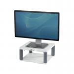 In this picture, we see the Fellowes Premium Monitor Riser Platinum 9171701 BB91717, along with Fellowes Monitor Stands and Dust Covers. The monitor stand is sleek and modern, with a silver and black color scheme. The dust covers are transparent and fit perfectly on top of the stand, protecting your monitor while maintaining a clean and professional look.
