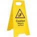 This image shows a brightly colored A-board sign from Spectrum Industrial Cleaning. The sign features the Beeswift B-Safe logo and warns of a slippery surface. The background is dark with a clean and professional design.