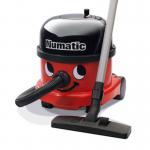 This picture shows a professional-grade commercial Numatic vacuum cleaner, specifically the Henry NRV 240 model. It comes with the NA1 accessory kit and operates on 240 volts. The vacuum features a compact and durable design, making it suitable for various cleaning tasks.