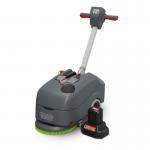 Numatic Vacuum Cleaners Numatic TTB1840NX Scrubber Dryer NU3001 is a compact commercial cleaning machine. Its sleek body features a large cylindrical scrubbing head, a long handle, and four wheels. The vibrant yellow color stands out against any surface, making it easy to spot and maneuver around tight spaces.