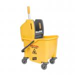 In the picture, there are two sturdy, white buckets with black handles labeled Blake & White Buckets. One bucket has a yellow 25 Litre label on it. There is also a yellow mop bucket with a smiley face symbol on it, labeled Purely Smile Kentucky Mop Bucket and Wringer. The buckets and wringer are all placed on a clean, shiny surface.