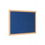 The photograph shows a large, rectangular noticeboard with a blue felt surface. The border is made of oak-colored MDF, giving it a sleek and professional appearance. The board is 240x120cm in size, making it ideal for displaying a large amount of information. The felt surface is perfect for pinning notes, flyers, and other important papers. This noticeboard is a practical and stylish addition to any office or classroom setting.