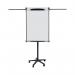 The image shows a Bi-Silque flipchart easel and pads, along with a Bi-Office mobile magnetic flipchart easel. The easels are positioned side by side and feature a sleek, modern design. The large easel measures 700x1000mm and is equipped with magnetic backing for easy display of materials. The pads are neatly stored on the lower shelf of the easels, ready for use. The overall appearance is professional, practical, and perfect for any office or meeting room setting.