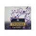 The picture shows a pack of 100 Twinings Earl Grey string and tag tea bags. The packaging is branded with the Twinings logo and features a close-up photo of the tea bags. The tea bags themselves are individually wrapped and include a string and tag for easy brewing. A variety of specialty teas are included in the pack.