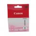 This photo shows a pack of Canon ink cartridges in a vibrant photo magenta color. The label reads Canon CLI-8PM and includes the model number and product name. The cartridges are neatly packed and ready for use.