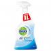 The image depicts a clear, plastic 1 litre bottle of Dettol Disinfectant Surface Cleanser. The label prominently displays the Dettol logo and name, with the product name and size underneath. The bottle has a red cap and contains a blue liquid inside. The background is a clean, white surface with no other objects in sight.