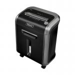 The picture shows a compact and sleek Fellowes Small Office Shredder, the Powershred 79ci, in a matte black finish. Its cross-cut blades are visible through the transparent window, ready to shred any confidential documents. The UK plug and 230V voltage indicate its compatibility for use in British office settings.