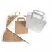 This image shows a stack of white paper carrier bags, measuring 500 x 140 x 540mm, with a quantity of 150 bags. The bags are neatly stacked on top of each other and appear to be made of thin, durable paper material. The neutral white color makes them versatile for various uses.