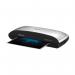 The photograph shows the sleek and modern Fellowes Laminating Machines Spectra A495 Laminator, designed for professional use. Its black and silver exterior gives it a professional look, and the clear display screen makes it easy to use. The laminator is plugged into a standard 230V UK outlet, ready for use.