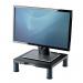 This picture shows a Fellowes monitor stand & dust cover. The stand is in a standard size and has a graphite color. It also features a riser to elevate the monitor.