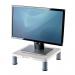 This picture shows the sleek and modern Fellowes Monitor Stands & Dust Covers Standard Monitor Riser Platinum 91712. The stand is elevated, with a smooth surface and a clean platinum color. The included dust cover helps protect the monitor from any debris.