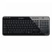 The photograph shows a standard black wireless Logitech K360 keyboard. It features a QWERTY English layout and the Logitech logo is displayed prominently on the bottom. The top of the keyboard is slightly angled, allowing for comfortable typing.