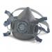 The photo features a Beeswift Twin Filter Mask with Respirators, designed for optimal protection. Bold black straps secure the mask in place while the twin filters provide a strong defense against air pollutants. The mask has a sleek, modern design, making it a functional and stylish choice for any job.