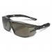 The image shows a pair of Beeswift glasses and goggles with smoke-colored lenses. The frames have an ergonomic temple cover for added comfort.